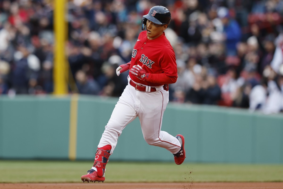 Masataka Yoshida rounds the bases after a home run for Boston.
